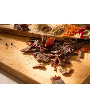 Biltong Boss Jerky Boss Sweet Hot Beef Jerky Sweet and Heat Ready To Eat Flavoured Meat High Protein Snack Suitable For Gluten-Free Paleo Keto Atkins Diets & Post-Workout Low Sugar & Carbs 100g - Buy Online on GoSupps.com