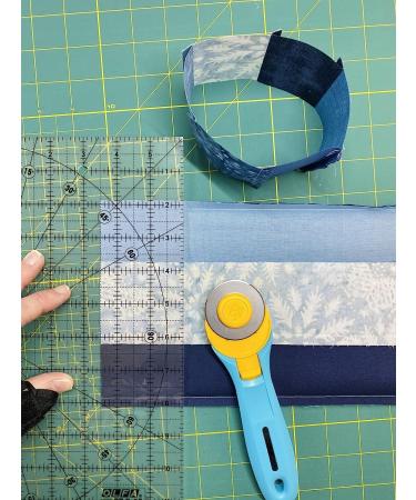 OLFA 45mm Quick-Change Rotary Cutter (RTY-2/C) with Blade Cover - Ideal for Crafts, Sewing, and Quilting - Includes Replacement Blade RB45-1 (Aqua) - Buy Online on GoSupps.com