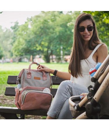 NEVEQ Babilation Wicking Pack | Large Capacity Multi-Compartment Travel Backpack for Diapers | Waterproof Baby Bag with Fan & Flasher - Gray & Pink - Buy Online on GoSupps.com
