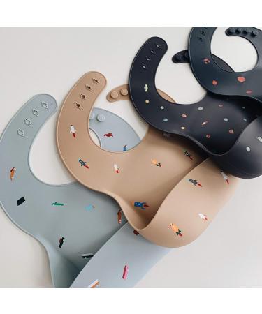 Mushie Baby Silicone Bib | Adjustable Waterproof Feeding Bib with Deep Pockets | BPA-Free Rocket Design - Buy Online on GoSupps.com