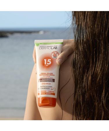 Dermolab - Sun cream for face and body medium protection SPF 15 with tanning accelerator contrasts skin aging and UVA rays water resistant tested - Buy Online on GoSupps.com