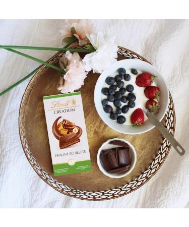 Lindt Creation Milk Chocolate Puff Praline Tablet 150 g - Buy Online on GoSupps.com