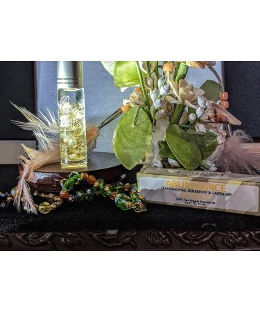 Crystal Roll-On Essential Oil for Abundance | Frankincense Geranium & Lavender | International Shipping Available - Buy Online on GoSupps.com