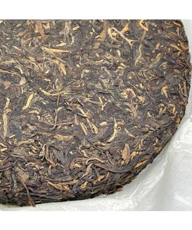 Pu-Erh tea 2014 Xigui Discus 357g Raw - Buy Online on GoSupps.com