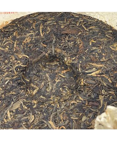 Pu-erh tea 2006 Xishuangbanna Yiwu Organic Green Cake 400g Raw - Buy Online on GoSupps.com