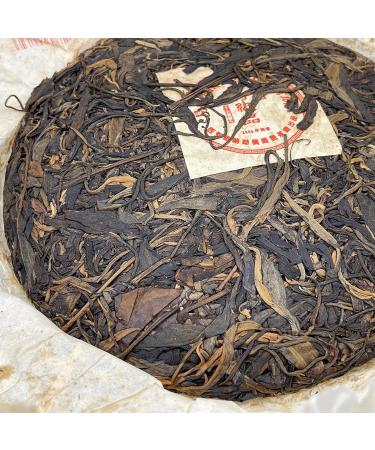 Pu-erh Tea 2006 Xishuangbanna Yiwuzhengshan Wild Big Leaf Green Cake 380g Raw - Buy Online on GoSupps.com