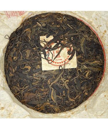 Pu-erh Tea 2006 Xishuangbanna Yiwuzhengshan Wild Big Leaf Green Cake 380g Raw - Buy Online on GoSupps.com