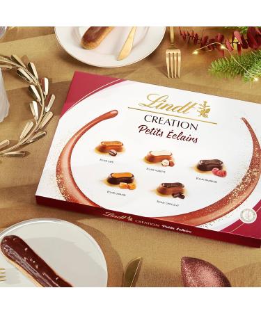 Lindt - CREATION Petit clairs box - Assortment of Milk Chocolates Black and White - Bakery inspiration - Ideal for Christmas 384 g - Buy Online on GoSupps.com