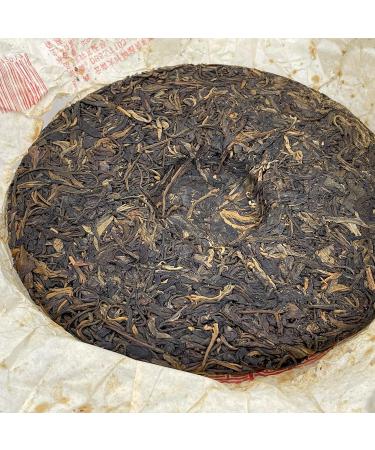 Pu-erh Tea 2006 Xishuangbanna Yiwuzhengshan Wild Big Leaf Green Cake 380g Raw - Buy Online on GoSupps.com