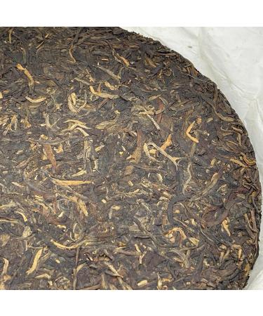 Pu-Erh tea 2014 Xigui Discus 357g Raw - Buy Online on GoSupps.com