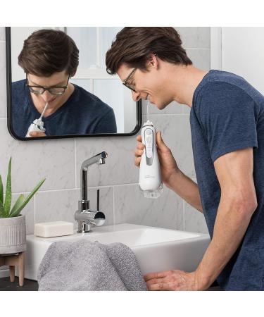 Waterpik Cordless Advanced Water Flosser - Wireless Oral Shower with 4 Attachments Adjustable Pressure Induction Charging - WP-560Eu - Buy Online on GoSupps.com