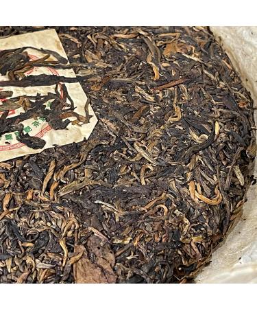 Pu-erh tea 2006 Xishuangbanna Yunnan Banzhang Ancient Tree Green Cake 380g Raw - Buy Online on GoSupps.com