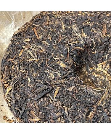 Pu-erh tea 2006 Xishuangbanna Yunnan Banzhang Ancient Tree Green Cake 380g Raw - Buy Online on GoSupps.com