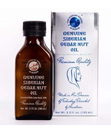 Premium Siberian cedar nut oil enriched with cedar resin 10 % - 100 ml. Native cold pressed with wood press.Smalling cedar in Russia.Made in Kins Siberia Russia.100ml