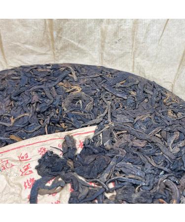 Pu-erh tea late 80s Ying Min Yuannian Qizi Cake Tea 357g Raw - Buy Online on GoSupps.com