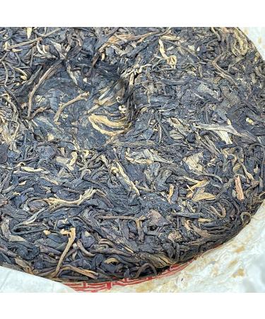 Pu-erh Tea 2006 Xishuangbanna Yiwuzhengshan Wild Big Leaf Green Cake 380g Raw - Buy Online on GoSupps.com