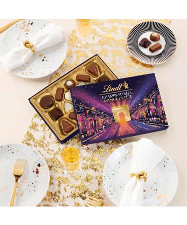 Lindt - Bo te CHAMPS- LYS ES dition Avenue en F te - Assortiment de Chocolats au Lait Noirs et Blancs - Pralin s Croustillants et Onctueux - Id al pour No l 177g - Buy Online on GoSupps.com