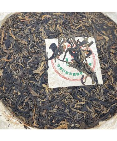 Pu-erh tea 2006 Xishuangbanna Yiwu Organic Green Cake 400g Raw - Buy Online on GoSupps.com