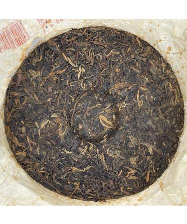 Pu-erh Tea 2006 Xishuangbanna Yiwuzhengshan Wild Big Leaf Green Cake 380g Raw - Buy Online on GoSupps.com