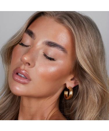 Shop REFY Gloss Highlighter - 0.67 oz/ 20 g Topaz - subtle golden undertones with a glass-like glow finish Online - Best Price & International Shipping - Buy Online on GoSupps.com