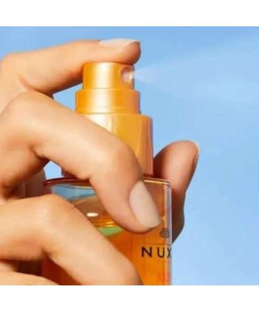 Nuxe Sun Moisturizing and Protective Dual Phase Hair Care Milk 100ml - Buy Online on GoSupps.com
