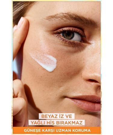 Garnier Ambre Solaire Super UV Vitamin C Anti-Dark Spot Fluid Cream SPF50+ 40ML - Buy Online on GoSupps.com