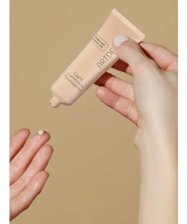 Artdeco Liquid tonal base tone 14 warm - beige sand - Buy Online on GoSupps.com