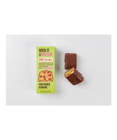 VkusVill Protein bar with pistachios and cranberries in chocolate cafe