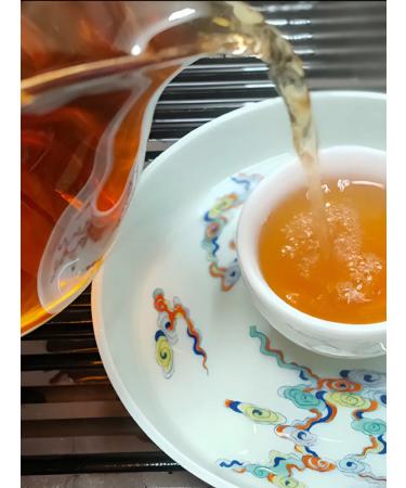 Dragon leaf Chinese tea Shan Puer Manku Guu Hua Bin 400g 2006 - Buy Online on GoSupps.com