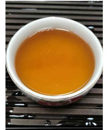Dragon leaf Chinese tea Shan Puer Manku Guu Hua Bin 400g 2006 - Buy Online on GoSupps.com