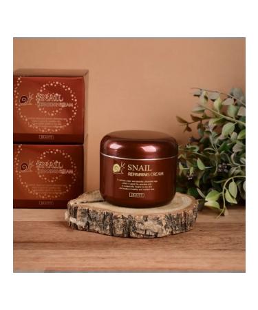 Jigott The cream restores for the face with mucin snails 100 ml - Buy Online on GoSupps.com