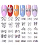 JERCLITY 33 Pcs Silver Alloy Bow Nail Charms - Iridescent Rhinestone & Pearl Nail Art Studs for Women & Girls - Buy Online on GoSupps.com