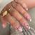 RikView French Tip Press on Nails Medium Acrylic Nails with Flowers Design Almond Fake Nails Nude Nails for Women Almond Nude Flowers