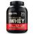 Optimum Nutrition Gold Standard 100% Whey Muscle Building and Recovery Protein Powder With Naturally Occurring Glutamine and BCAA Amino Acids Chocolate Hazelnut Flavour 71 Servings 2.27 kg