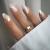 Justotry 24 pieces gold wavy stiletto nails to stick on short white French press on nails pretty almond art nail fake nails medium fingernails artificial nails for women white & wavy1