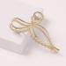 The Hair Edit Gold Gilded Bow Claw Clip - Transform Your Style with the Best Innovation Today! - Buy Online on GoSupps.com