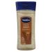 Vaseline Cocoa Radiant Body Oil 6.8 Oz - Intensive Care Cocoa Butter Gel Body Oil | Bundled With Bath Sponge Deeply Hydrating Cocoa Butter Body Oil For Soft & Supple Skin Pack Of 3