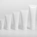 20 White Plastic Refill Bottles for Cosmetics - Leak-Proof Makeup Travel Tubes with Hinged Lid - Buy Online on GoSupps.com