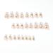 Spring Nails: White French Tip Press-On Medium Almond Shape with Camellia Green Flower | 24 Full Cover Natural Nude Fake Nails for Women - Buy Online on GoSupps.com