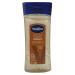 Vaseline Cocoa Radiant Body Oil - 6.8 Oz Intensive Care Cocoa Butter Gel & Bath Sponge | Deeply Hydrating Cocoa Butter Oil for Soft Skin Pack of 3 - Buy Internationally - Buy Online on GoSupps.com