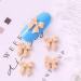 3D Charm 50Pcs Resin Nail Jewelry Ornaments Nail Art Bowknots Manicure Accessories Mini Bow Nail Jewelry Nail Art Decorations Nail Bow Ties(beige) - Buy Online on GoSupps.com