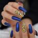 Hujl artificial nails "Punkgold and blue diamonds are pressed on the artificial nails and the extra long matt coff" are applied to the nails. "