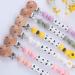 Personalized Daisy Silicone Pacifier Clip - Custom Name Holder for Teethers & Toys (Pink) - Buy Online on GoSupps.com