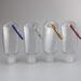 VerteLife 5PCS 50ml Refillable Travel Bottles with Keychain Clip - Clear Plastic Hand Sanitizer Containers for Toiletries - 5 Colors - Buy Online on GoSupps.com