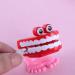 Shop Cute Wind-Up Zany Packbling Toys - 8 Funny Chattering & Jumping Party Favors for Kids | International Shipping Available - Buy Online on GoSupps.com