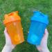 OOTD Protein Shaker Bottle 400ml - Leakproof BPA Free Perfect for Creamy Whey Protein Shakes - Includes Sieve & Scale (2PCs: Blue & Orange) - Buy Online on GoSupps.com