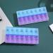 Twice-A-Day Economy Weekly Pill Organizer - Easy-Open AM/PM Medication & Vitamin Storage (Blue & Purple - Buy Online on GoSupps.com