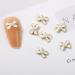 FEIlei 10Pcs 3D Bow Nail Charms Pearl Bowknot Nail Art Decorations Metal Nail Studs - Buy Online on GoSupps.com