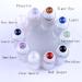 10 Pack 10ml Gemstone Roller Bottles with Healing Crystal Chips - Clear Glass Roll on Bottle for Essential Oils - Silver Lid - Natural Crystal Stones Roller Balls - Buy Online on GoSupps.com