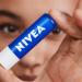 NIVEA Lip Balm Original Care (4.8g) Protective Lip Moisturiser with Shea Butter and Natural Oils Caring Lip Balm for 24h Moisture Care Melt-In Lip Care Original 1 count (Pack of 1) - Buy Online on GoSupps.com